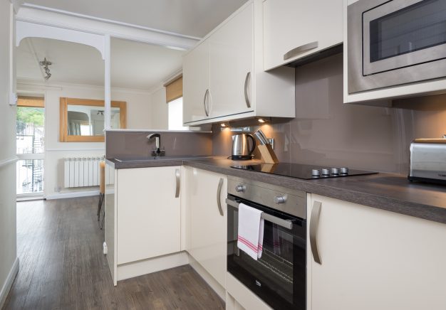 Modern, newly refurbished kitchen in our Keswick self catering apartment.