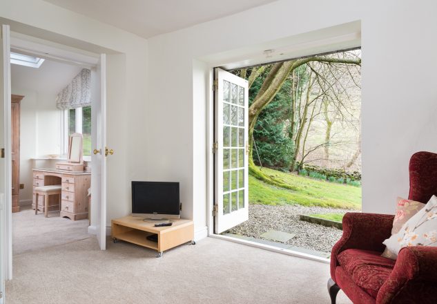 The downstairs suite with it's own bathroom and access to the garden.