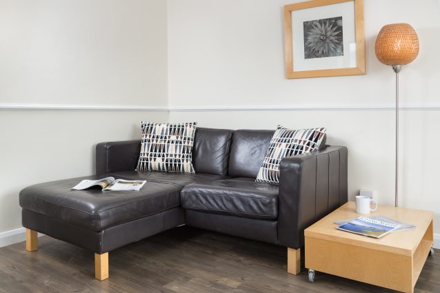 Comfy sofa for two in our Keswick self catering apartment.