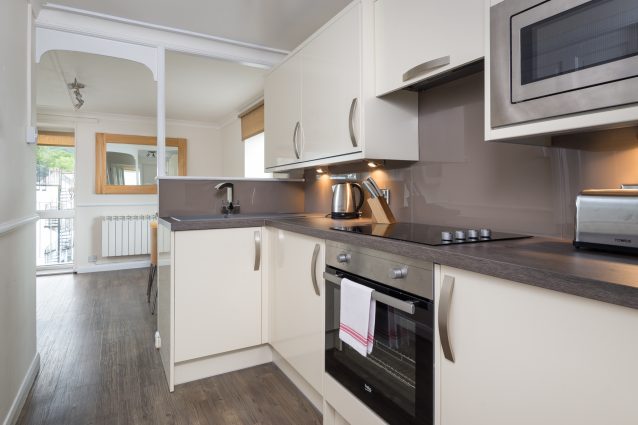 Modern, newly refurbished kitchen in our Keswick self catering apartment.