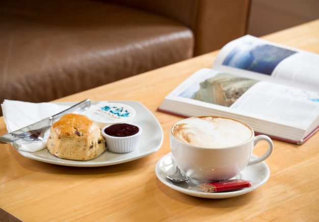 Relax with a cup of coffee and a book in our cafe