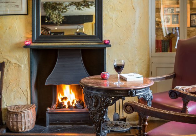 Relax by the open fire at Traveller's Rest Grasmere